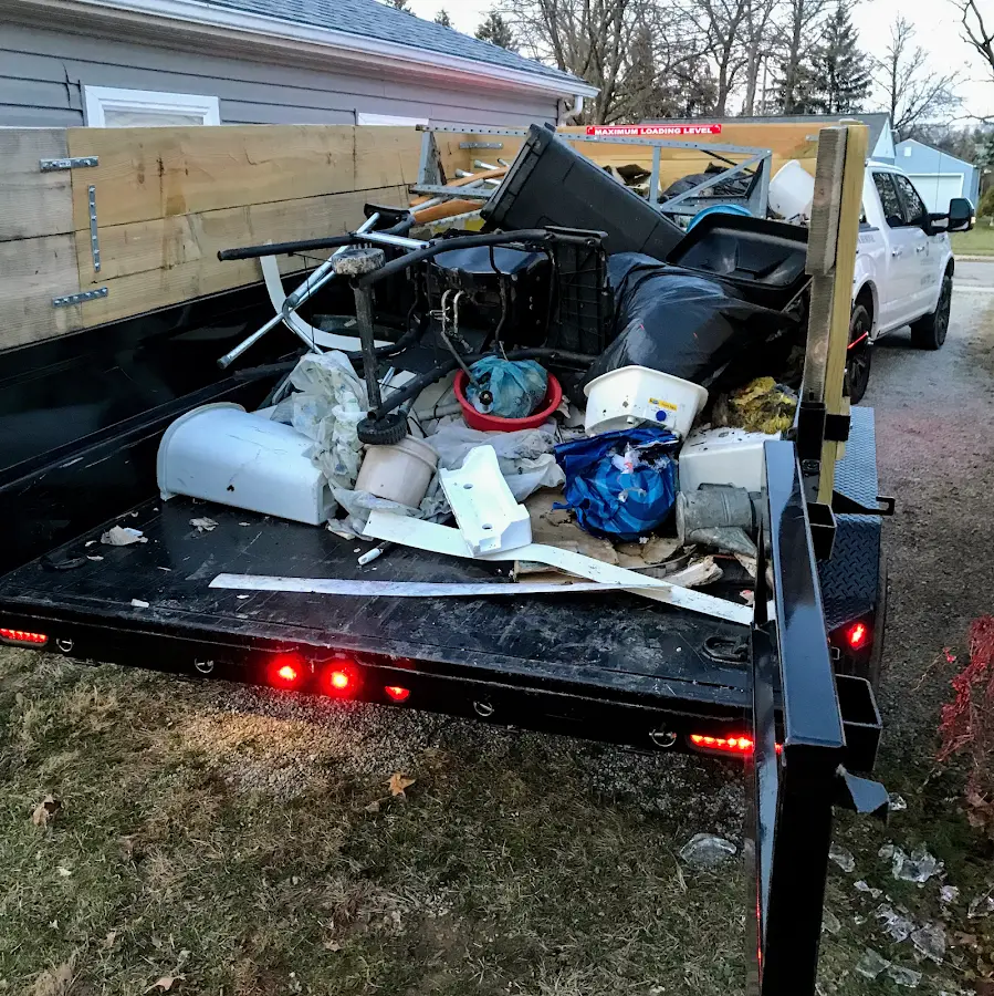 Roll-off dumpster delivered to a residential driveway in Hollywood